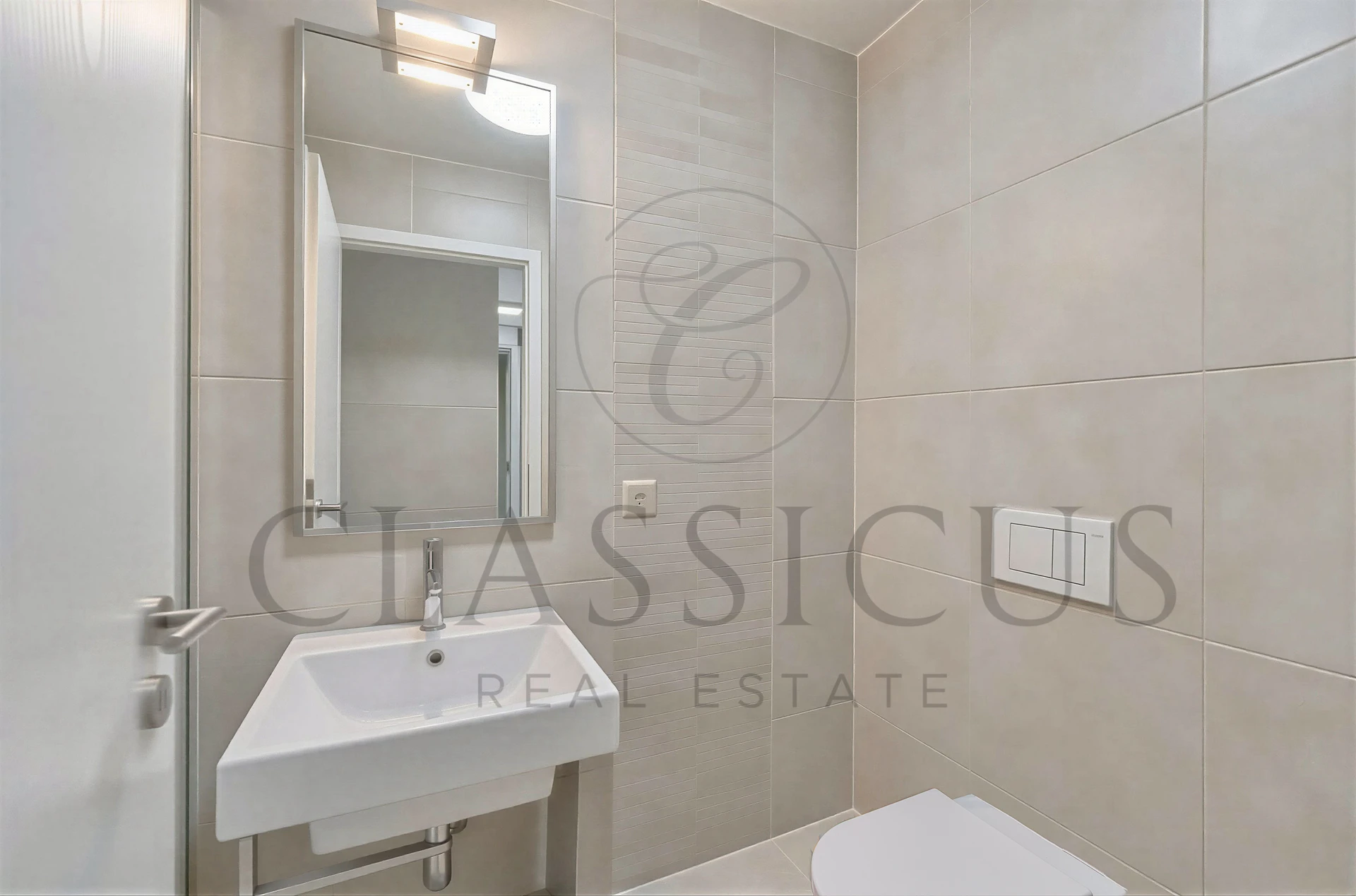 La Plaine – Appartement 4 pièces contemporain avec balcon, parking intérieur et accès immédiat à la gare